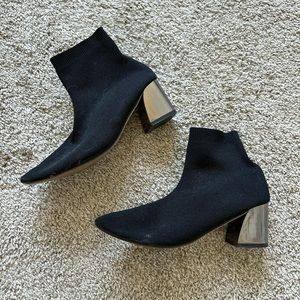 Sock boots with metal heels